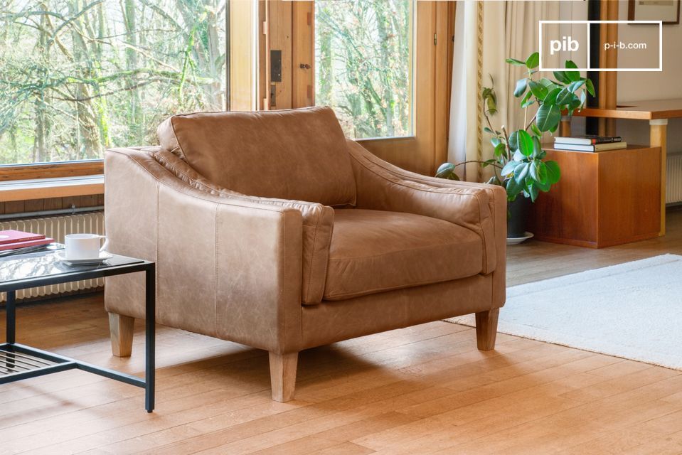 Magnifique fauteuil en cuir pleine fleur.