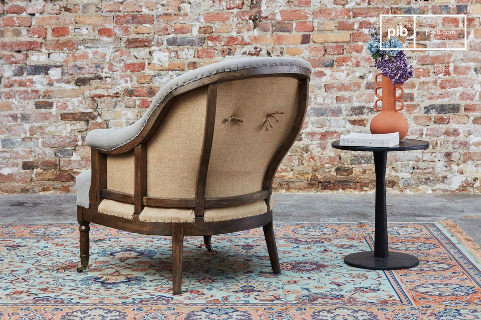 Le fauteuil rond Léonie est un joli fauteuil en tissu gris qui apportera un charme campagne bohème