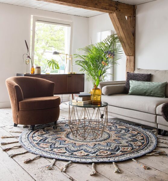 Tapis rond pour accompagner une table basse circulaire